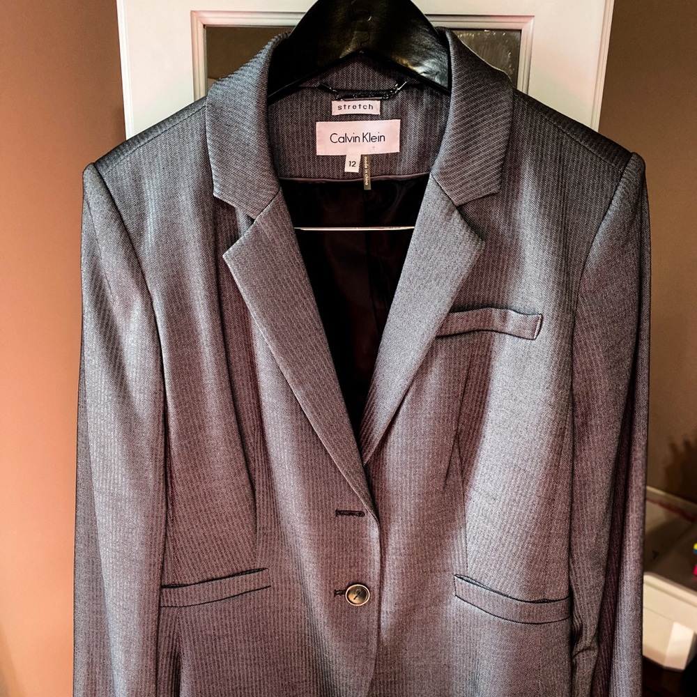 Suit jacket and skirt from “Calvin Klein”